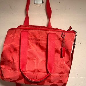 Pink Coach crossbody bag